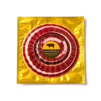 100% Iberico acorn-fed ham hand-sliced pack by Paquito Jamon on white background