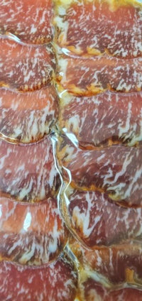 100% Iberico Acorn-Fed Lomo Sliced By The Hamoneria
